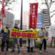Protesters shout slogans outside the venue of an evacuation drill simulating a North Korea ballistic missile attack in Tokyo.
